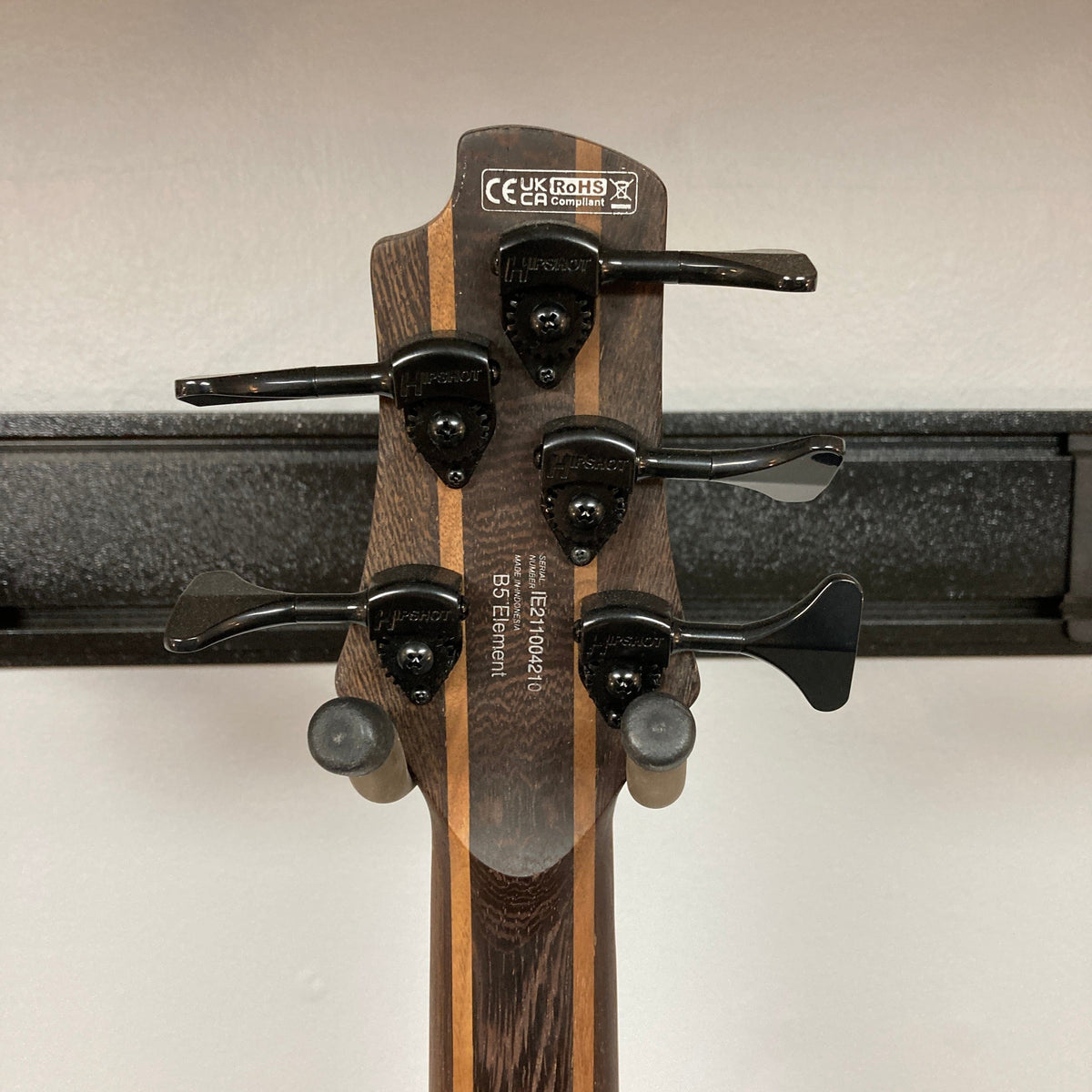 Close-up of Cort Artisan B5 Element Natural Used guitar, highlighting detailed craftsmanship and wood texture, available at Guitars on Main.