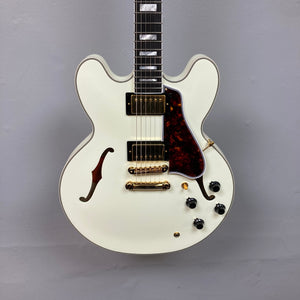 Epiphone IGC 1959 ES-355 Classic White Electric Guitar with gold hardware, black knobs, and intricate mother-of-pearl inlays.