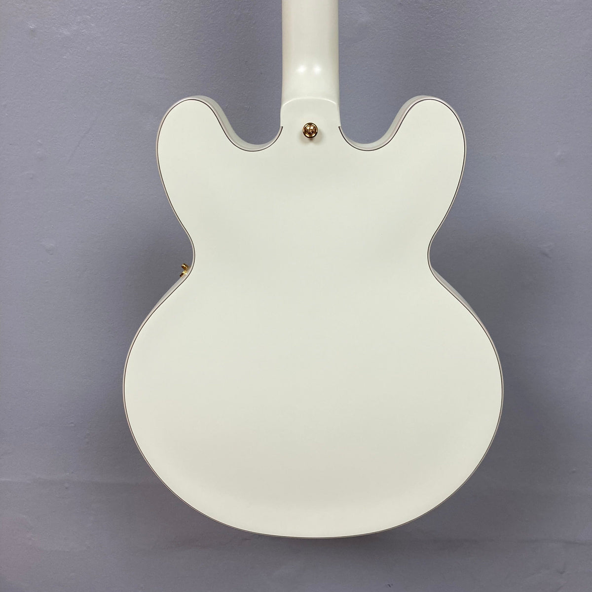 Epiphone IGC 1959 ES-355 Classic White Electric Guitar with gold accents and detailed inlay work.