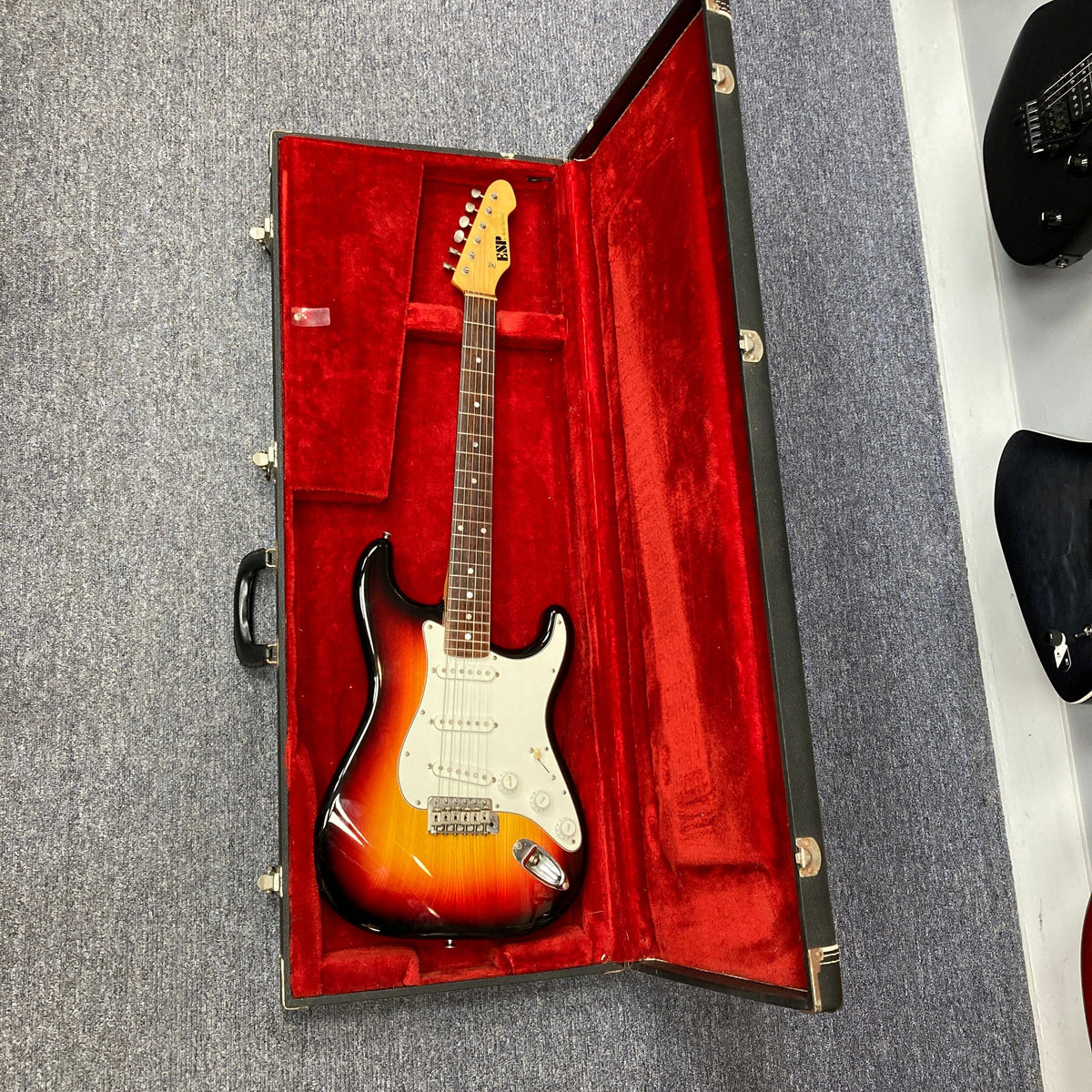 ESP Japan 400 Series Strat style electric guitar in a fitted case, showcasing its detailed craftsmanship and design, ideal for musicians seeking quality instruments.