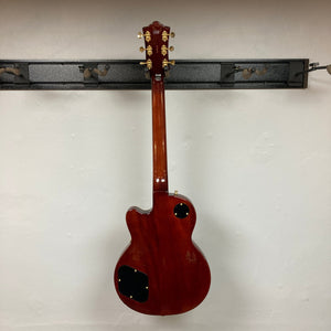 Guild Aristocrat P90 Consign guitar displayed on a wall, showcasing its fine craftsmanship and detailed features, ideal for music enthusiasts and collectors.