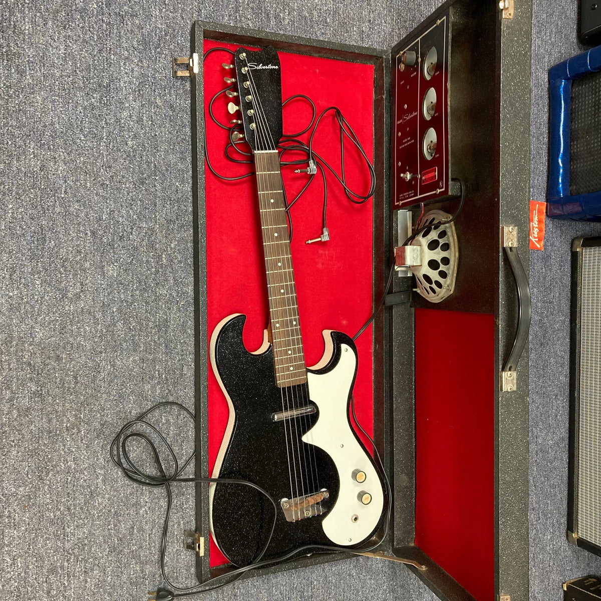 Sears Silvertone 1448 1960s Black Sparkle guitar in a case with built-in tube amp.