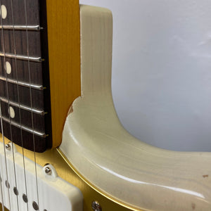 Close-up of TopHat 59 Jazzavarius Blonde See Through Relic guitar, highlighting its strings, pickups, and vintage-style neck.