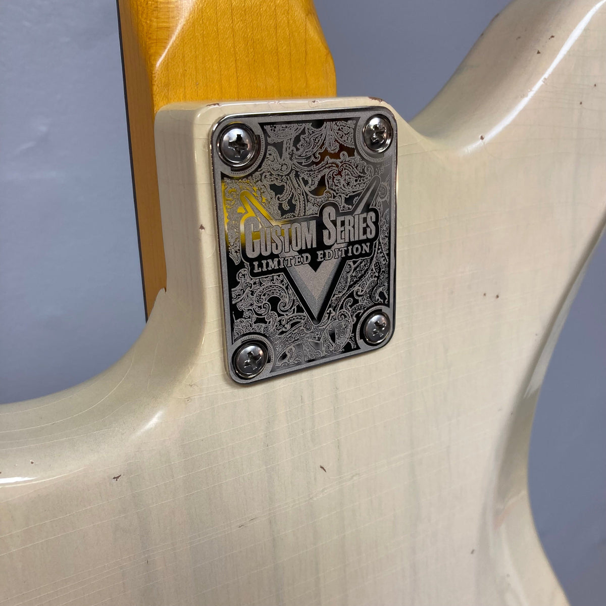 TopHat 59 Jazzavarius Blonde See Through Relic guitar with vintage tuners, gold anodized guard, and upgraded pickups, showcasing its detailed craftsmanship.