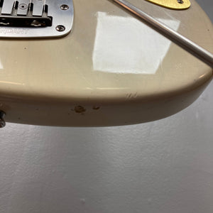 Close-up of the TopHat 59 Jazzavarius Blonde See Through electric guitar, showcasing its vintage-style neck, anodized guard, and upgraded pickups.