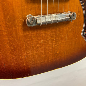 TopHat Telavarius Junior Relic Sunburst guitar, close-up of strings and mahogany body, showcasing its intricate craftsmanship and single dogear P90 pickup.