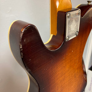 TopHat Telavarius Junior Relic Sunburst guitar close-up, showcasing single dogear P90 pickup, Faber wraparound bridge, and double-bound mahogany body with nitro lacquer finish.