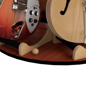 Carousel Deluxe Multi-Guitar Stand holding multiple guitars, showcasing its rotating base and secure neck gates for easy access and display.