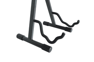 Gator Frameworks A Style Guitar Stand close-up, featuring a rubberized cradle, adjustable width, and foldable steel design for guitars, ukuleles, or violins.