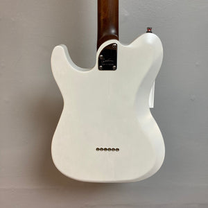 Godin Stadium HT Trans White RN electric guitar with a satin-finished maple neck, brass saddle bridge, and gig bag, displayed on a wall.