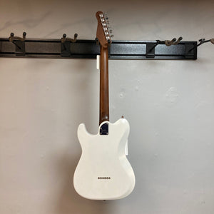 Godin Stadium HT Trans White RN electric guitar with a maple neck and rosewood fingerboard, displayed on a wall. Comes with a gig bag.