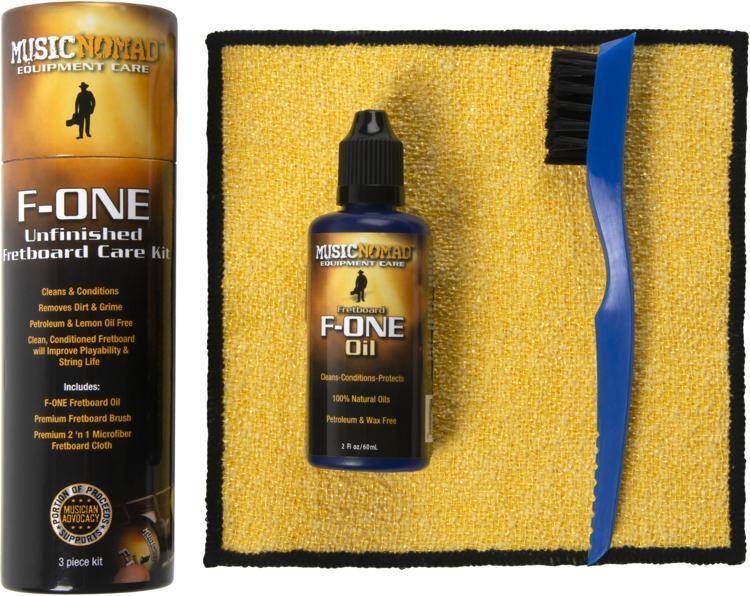 Music Nomad F-ONE Unfinished Fretboard Kit with oil bottle and precision cleaning brush for restoring and protecting guitar fretboards.