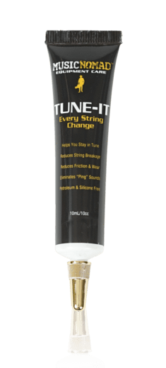 Music Nomad Tune-It lubricant in a black tube with yellow text, ideal for guitar maintenance to reduce string breakage and improve tuning stability.