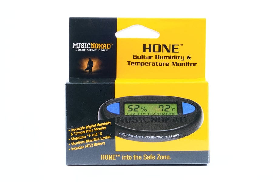 MusicNomad Hone Guitar Hygrometer in packaging, shown with a digital display, designed for monitoring humidity and temperature for string instruments.