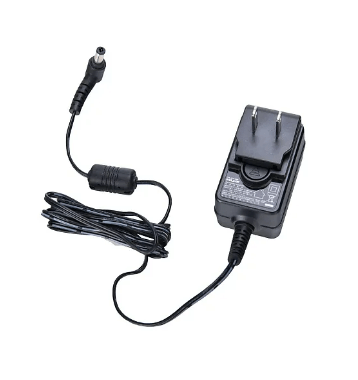 NUX 9V Power Supply with wire and plug, ideal for NUX pedals, ensures stable voltage and efficient power conversion.