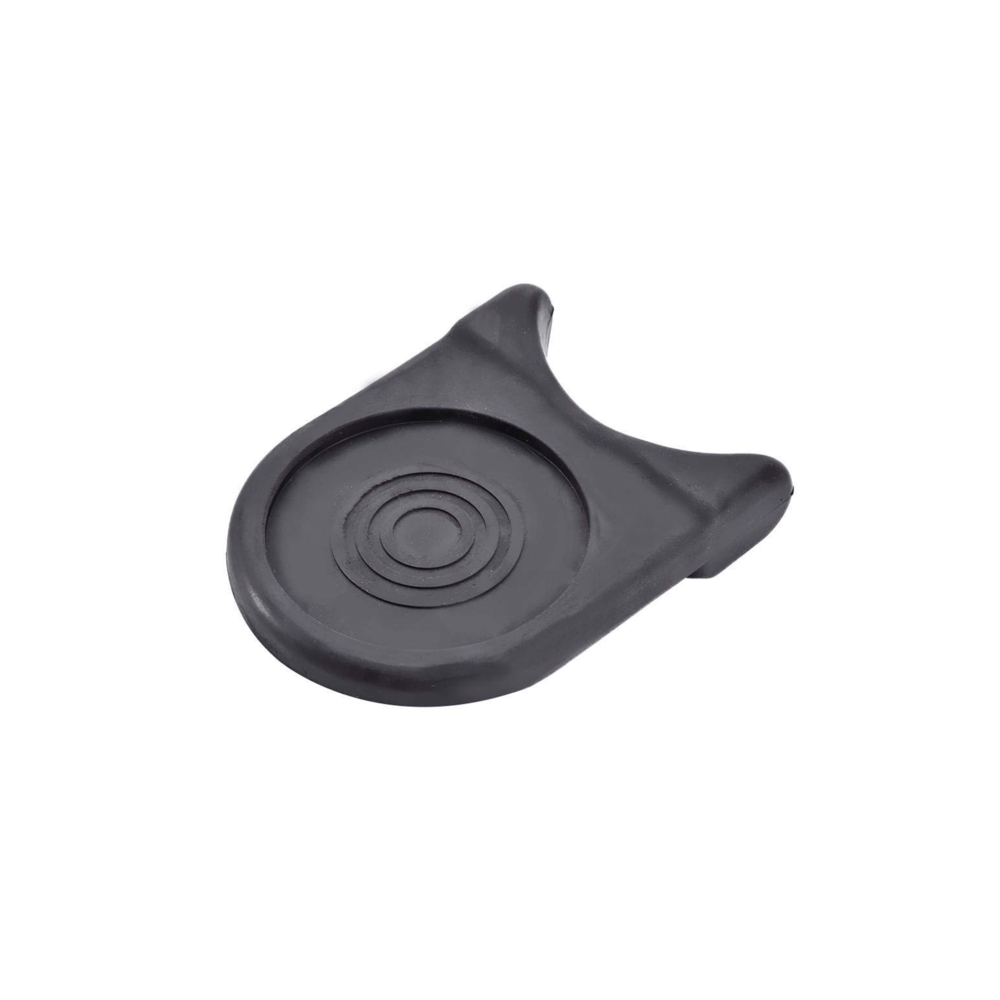 Black rubber guitar rest with a circular design, ideal for turning any flat surface into a guitar stand.