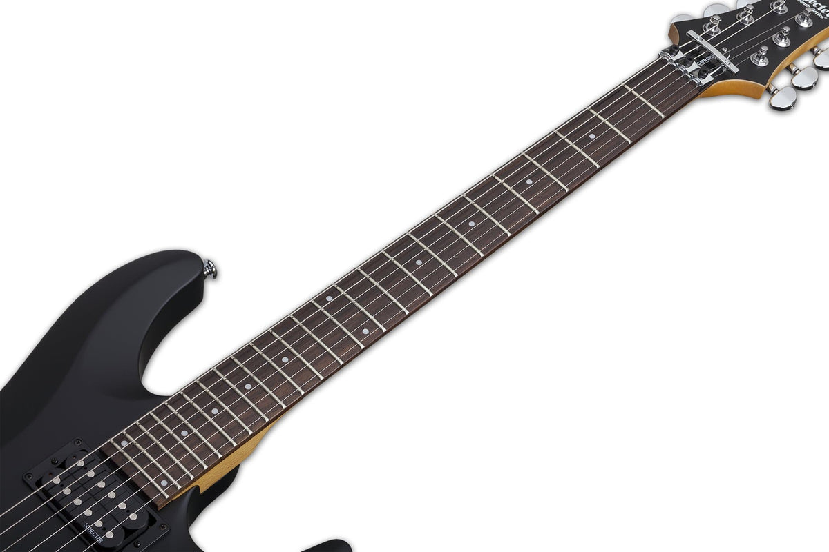 Schecter C-6 FR Deluxe SBK electric guitar with humbucker pickups and Floyd Rose tremolo.