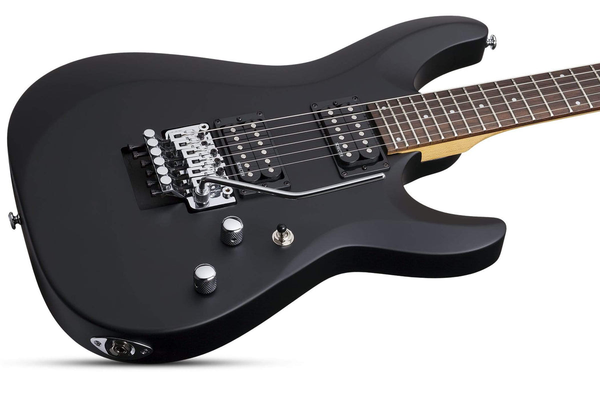 Schecter C-6 FR Deluxe SBK electric guitar with double humbuckers and Floyd Rose tremolo.