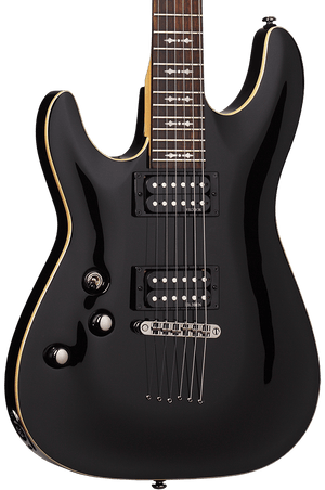 Schecter Omen-6 LH black electric guitar with gold trim, close-up of strings and body, featuring a rosewood fretboard and black chrome hardware.