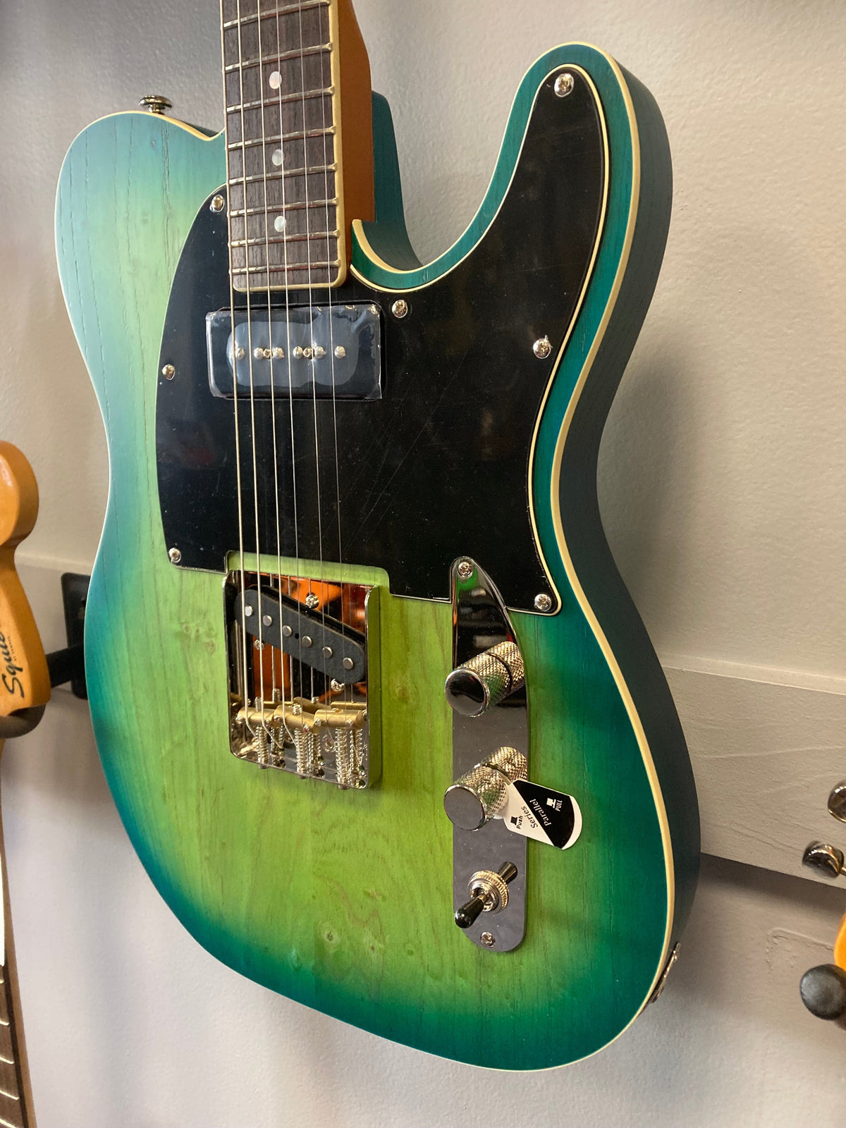 Schecter PT Special electric guitar in Aqua Burst Pearl, featuring a maple neck, rosewood fretboard, and Grover Vintage tuners.