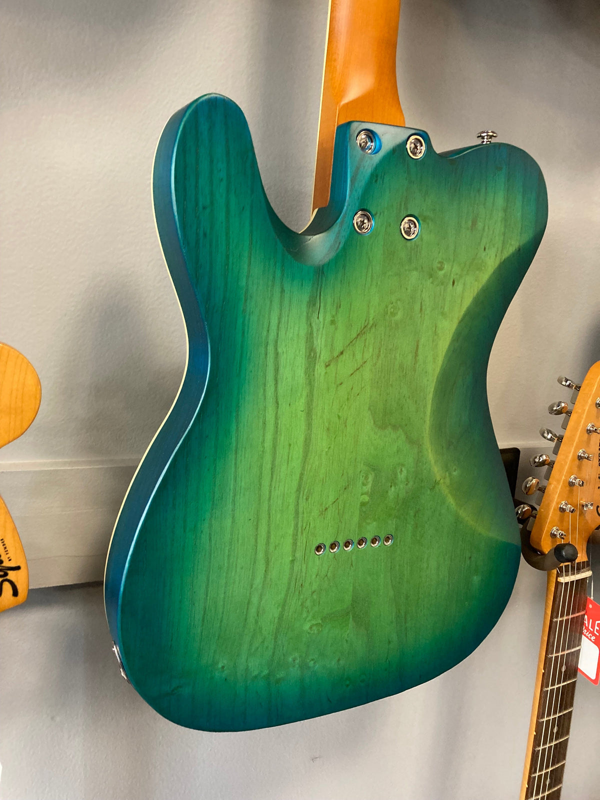 Schecter PT Special electric guitar in Aqua Burst Pearl finish, featuring a rosewood fretboard and vintage hardware.